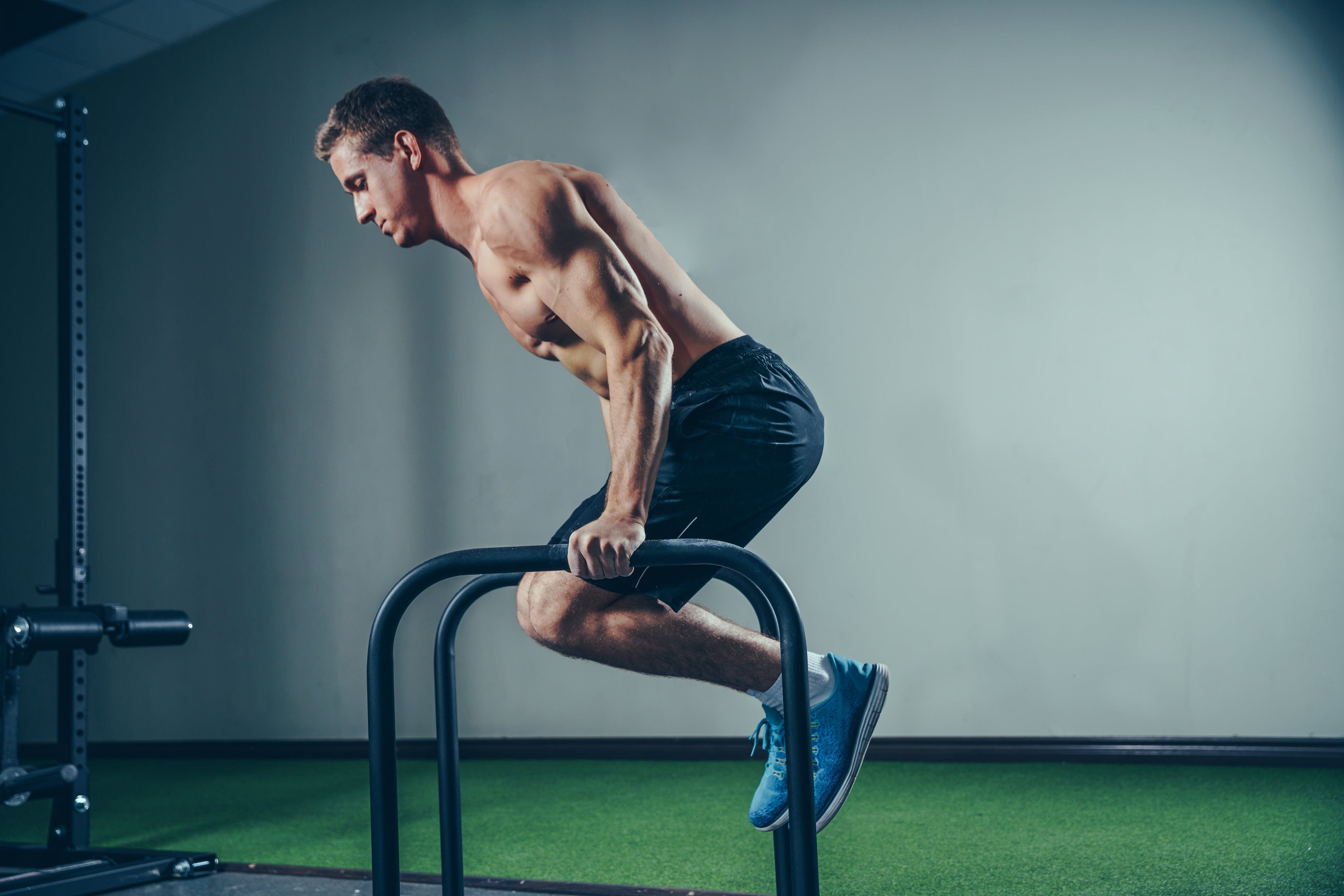 Man with smooth skin working out at gym